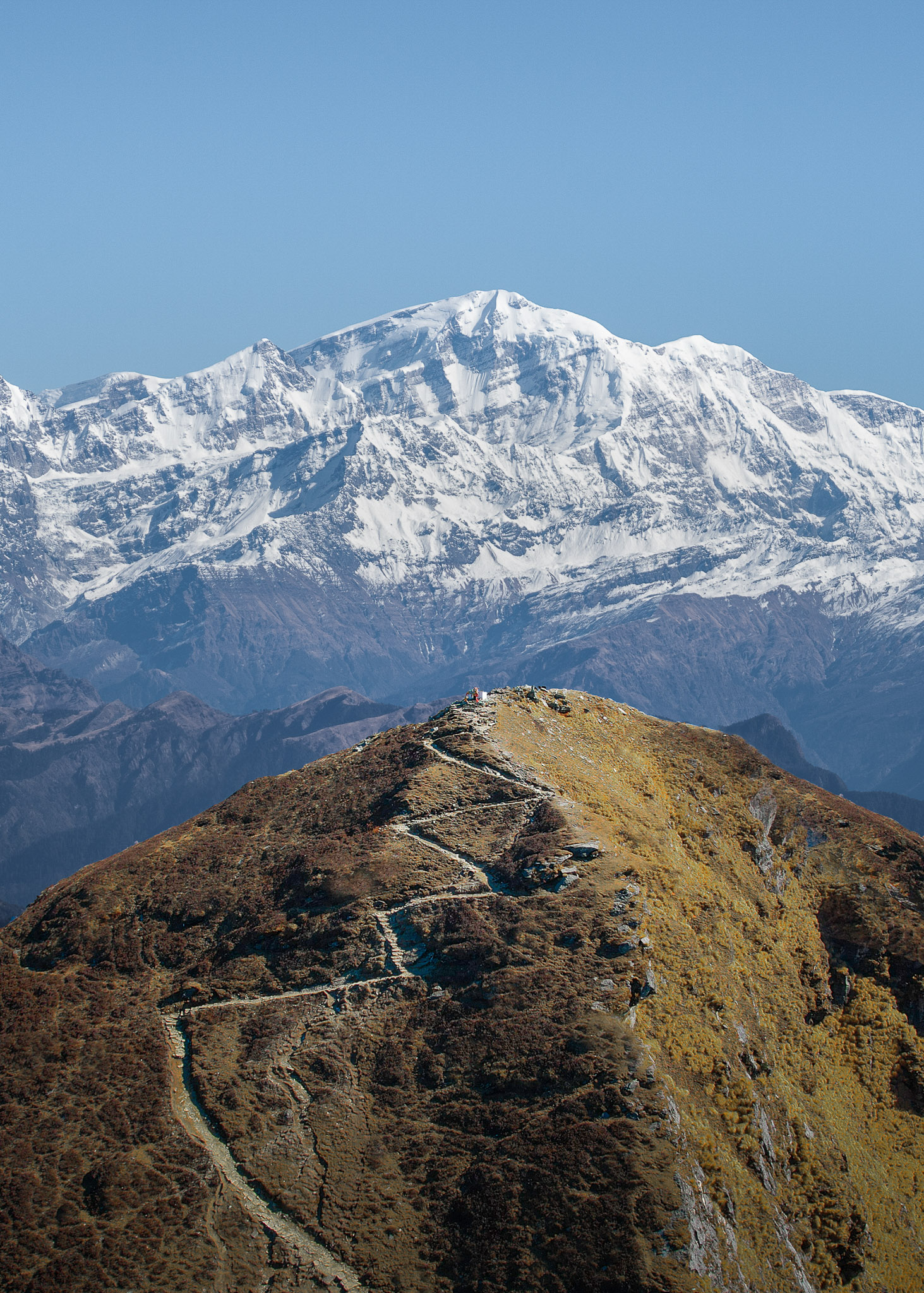 Snow-streaked Himalayan peaks at high altitude in the early morning