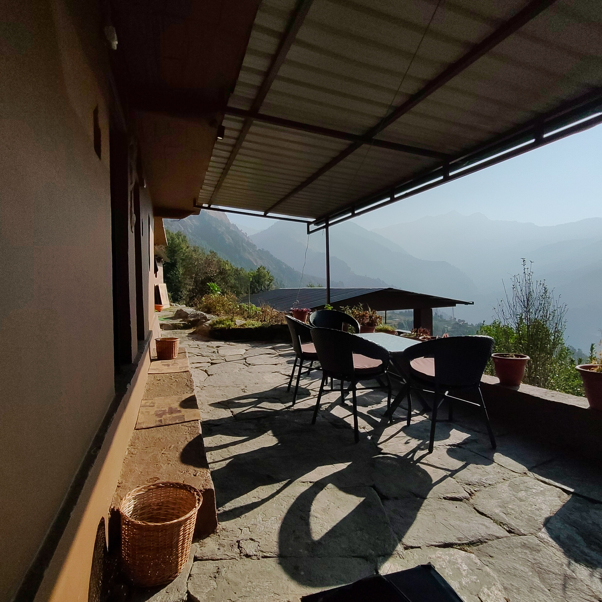 Shared patio of the Pahadi Original rooms — The Tāl, Sari