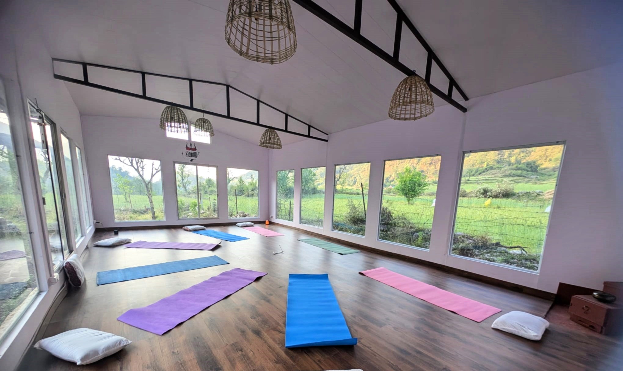 Light-filled yogashala by the fields at Dea Avnovā, Mandal